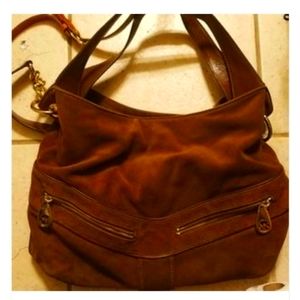 Soft suede makes up with grogeous vintage Michael Kors purse. Perfect condition.